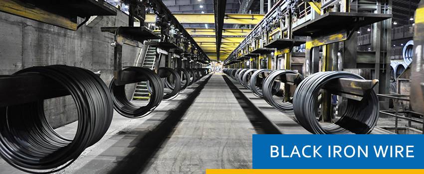 This is a picture of black iron wire production, many black iron wire coils in the workshop.
