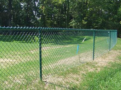 PVC coated chain link fence for protecting forest space.
