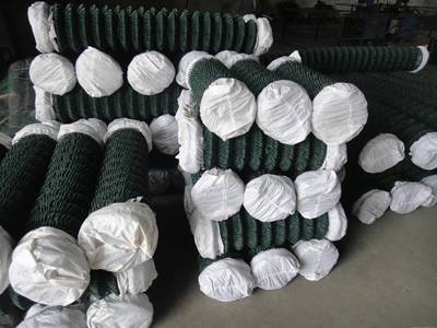 Green PVC coated wire application for chain link fence.