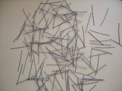 Many corrugated shape steel fibers to be shown.