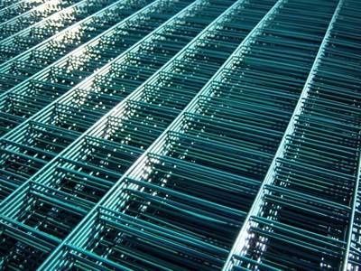 Welded mesh panel with green PVC coated surface.